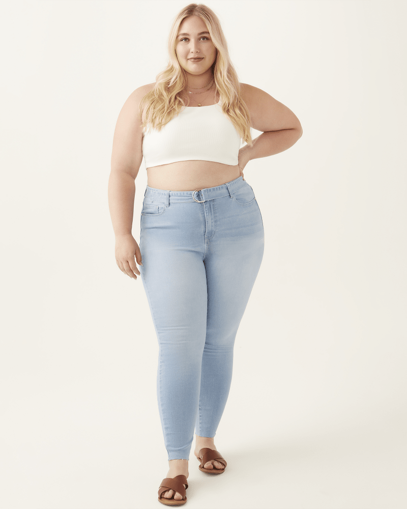 Plus size model with pear body shape wearing  by Elite Jeans | Dia&Co | dia_product_style_image_id:206424